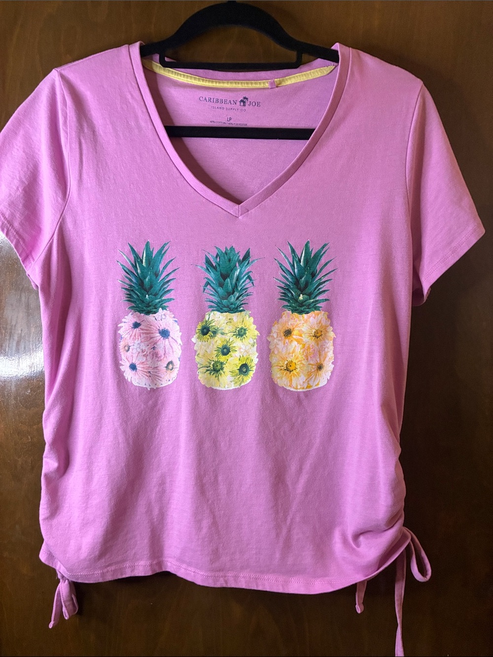 Caribbean Joe Pink V-Neck Short Sleeve Tee with Triple Pineapple Floral Graphic